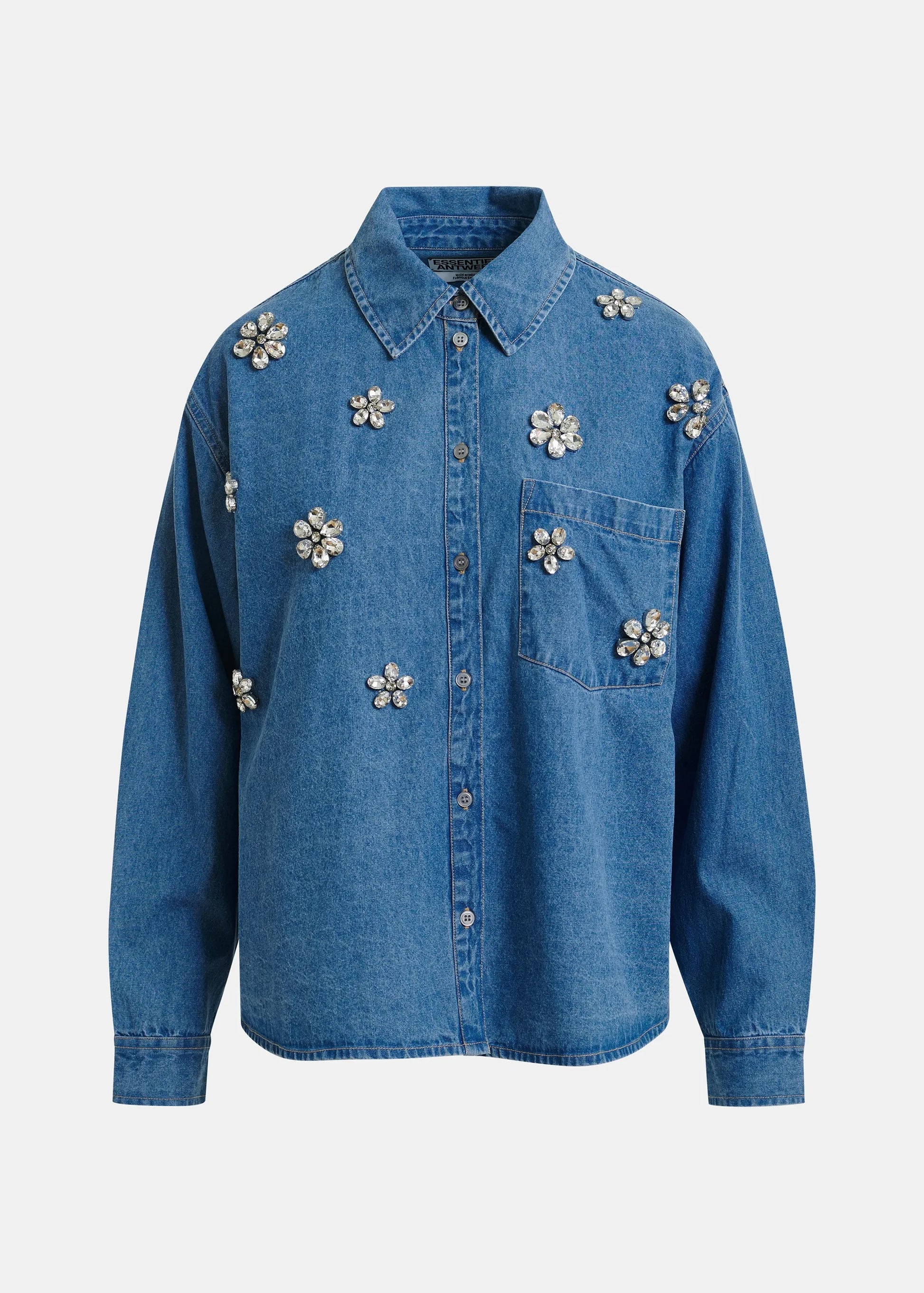 Blue denim shirt with floral rhinestone embellishments from essentiel antwerp