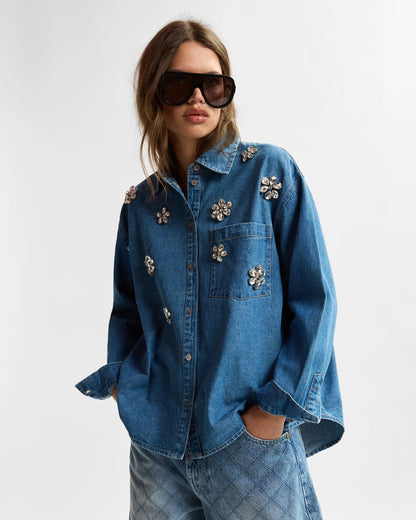Blue denim shirt with floral rhinestone embellishments from essentiel antwerp