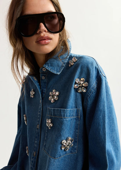 Blue denim shirt with floral rhinestone embellishments from essentiel antwerp