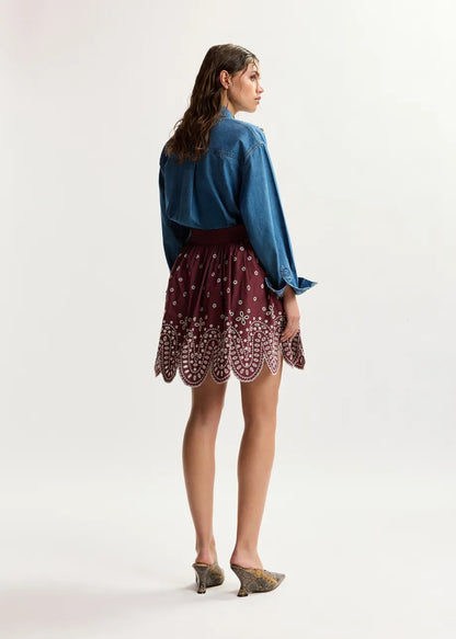 Dark red and white embroidered cotton skirt with scalloped hemline
