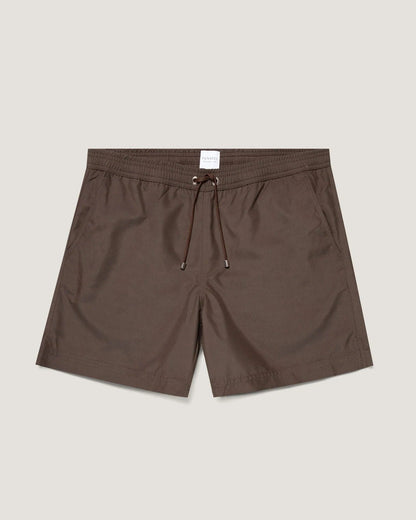 Brown shorts with a drawstring on a light beige background