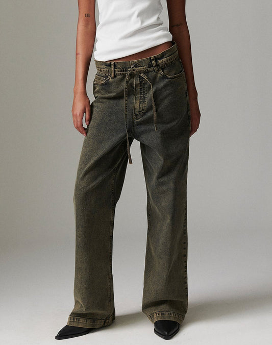 Close view of DAY Birger ét Mikkelsen Elijah Elm Overdye Denim in elmwood showing tie belt, five-pocket design, and straight-leg fit.