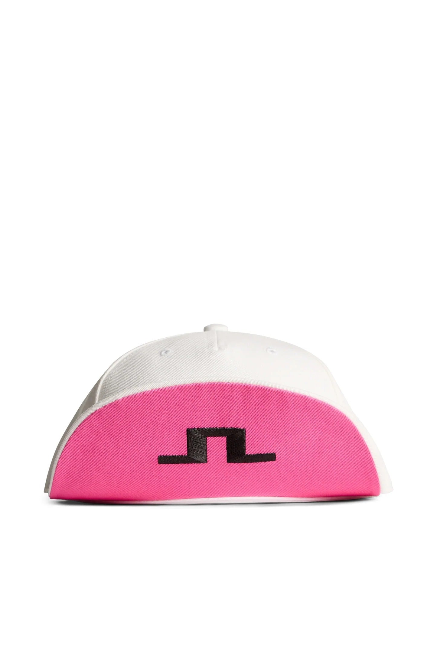 A curved baseball cap in white and bright pink, featuring a black stylized logo on the front pink panel, set against a plain white background.