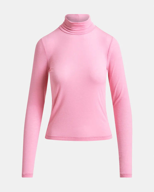 Pink turtleneck sweater on a light gray background