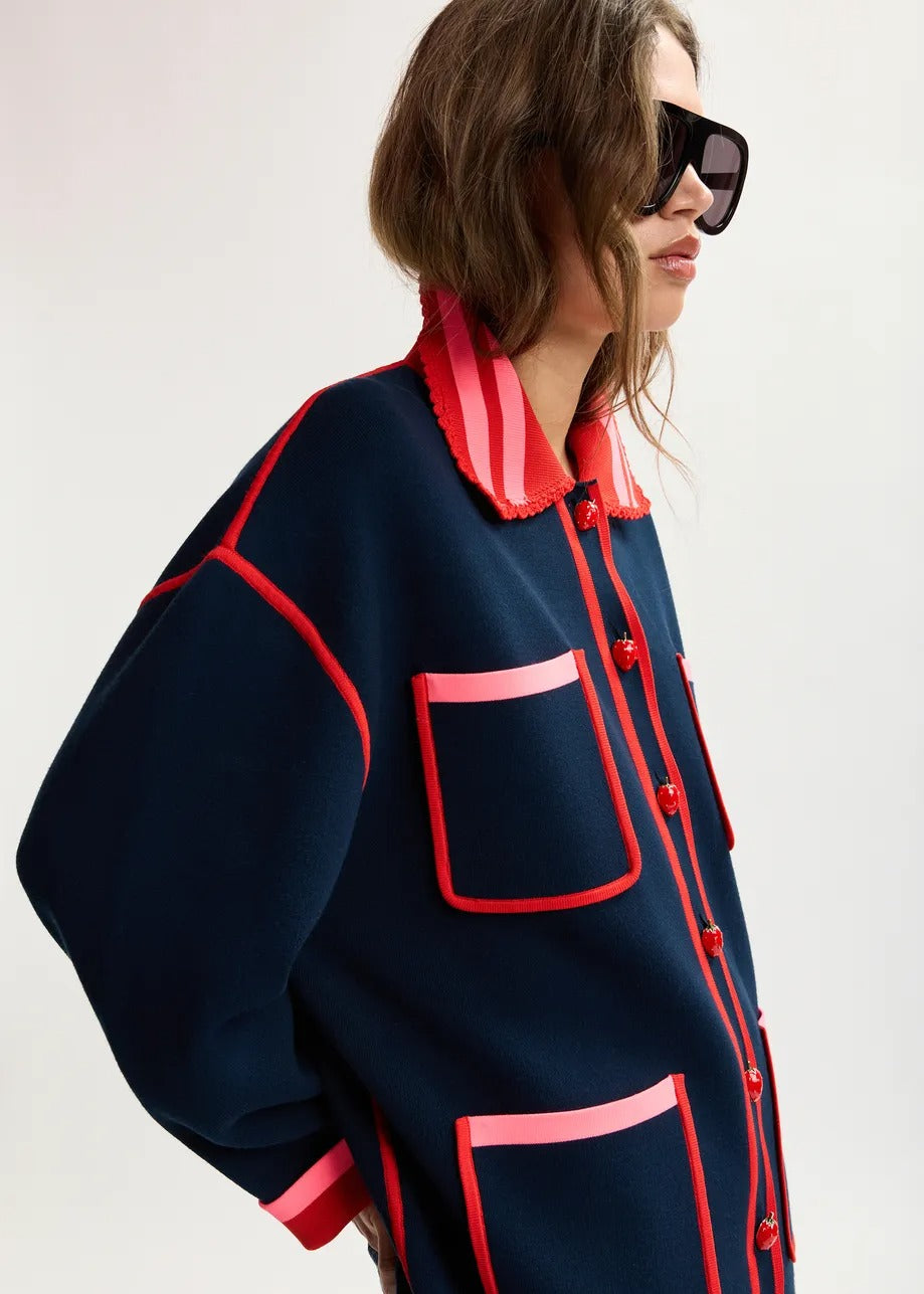 Navy, red and pink fine knit cardigan with lace-trimmed collar and strawberry-shaped buttons
