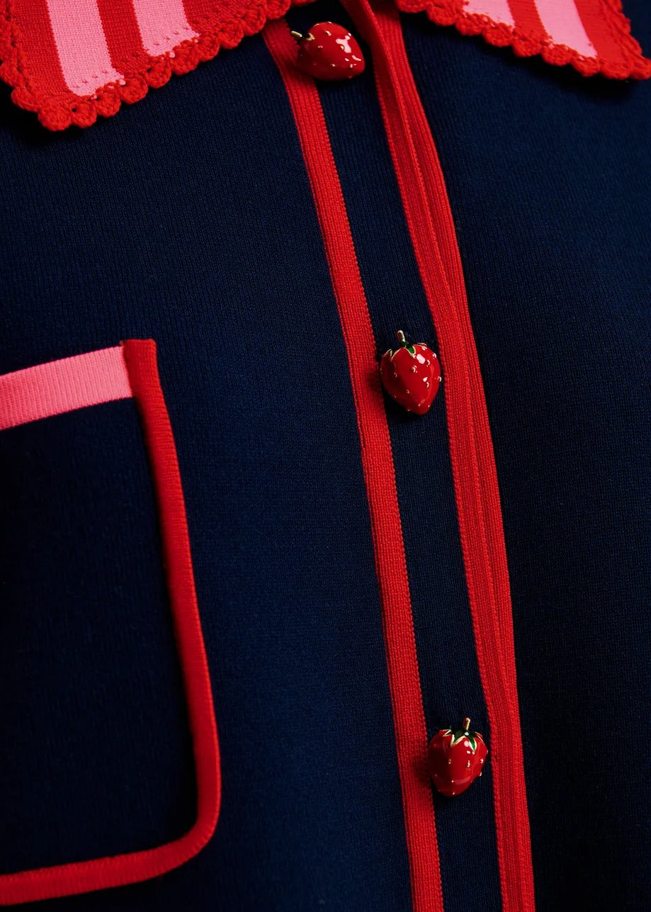 Navy, red and pink fine knit cardigan with lace-trimmed collar and strawberry-shaped buttons
