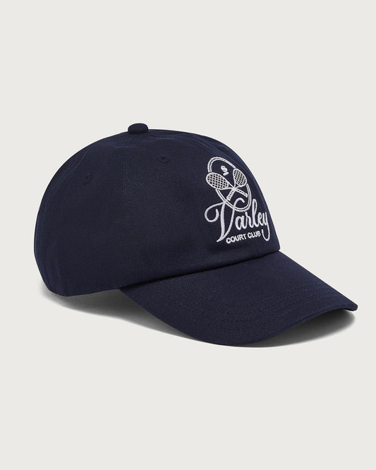 Navy blue cap with white logo on a light gray background