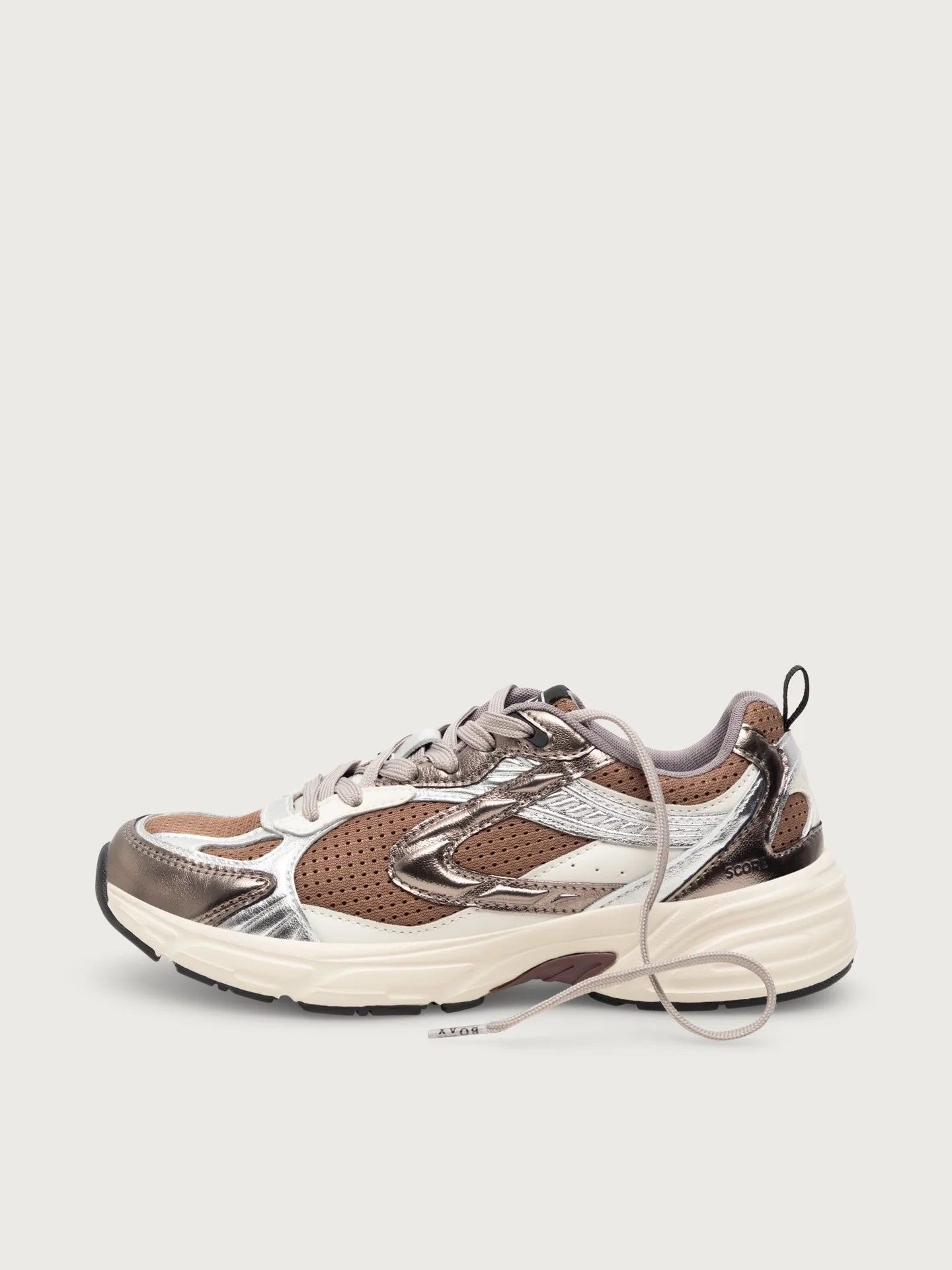A low-top chunky sneaker in metallic bronze, silver, and brown mesh with a thick off-white sole, shown from a side profile on a light gray background.