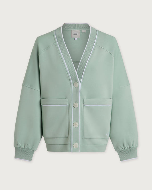 Light green cardigan with white trim on a light gray background