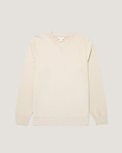 Beige sweater on a light gray background