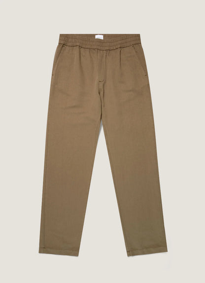 Brown pants on a light beige background