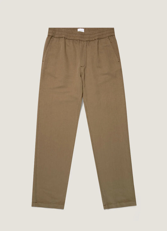 Brown pants on a light beige background
